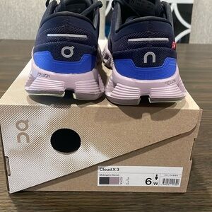 Like new On Cloud running shoes only worn a handful of times. No damage.